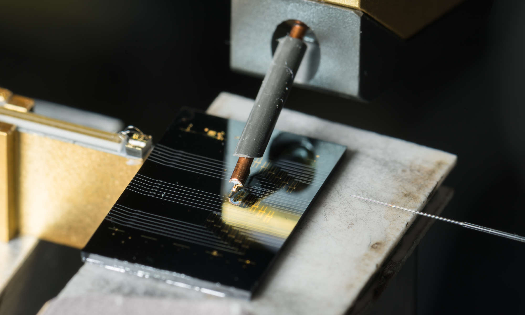 Feature image Close-up of a chip-scale microcomb laser.